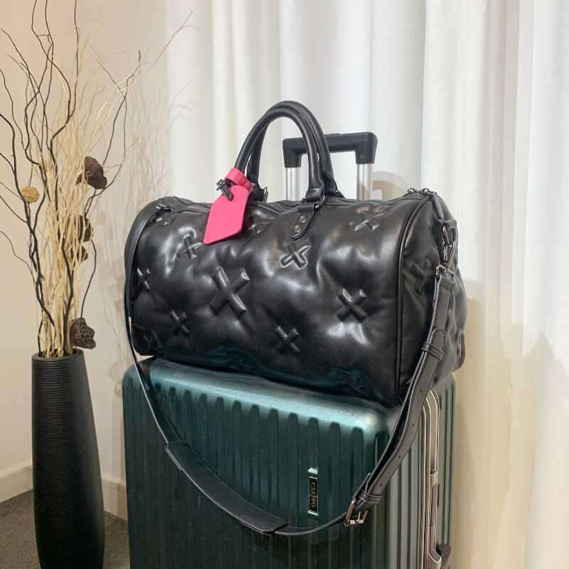 モノグラム柄レザーボストンバッグ